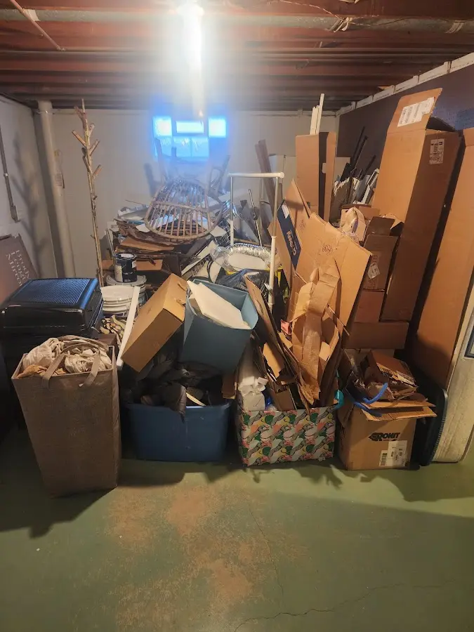 Roll-off dumpster container at job site for 20 Yard Dumpster Rental in Coldwater